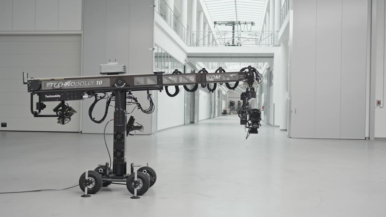 Technodolly 10 robotic camera crane in a bright hall
